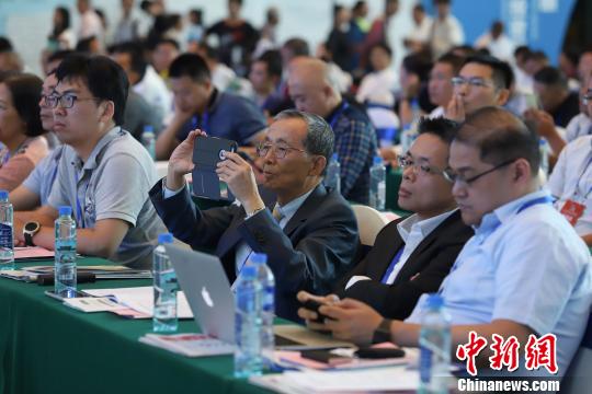 研討會現(xiàn)場圖?！■暮陚?攝